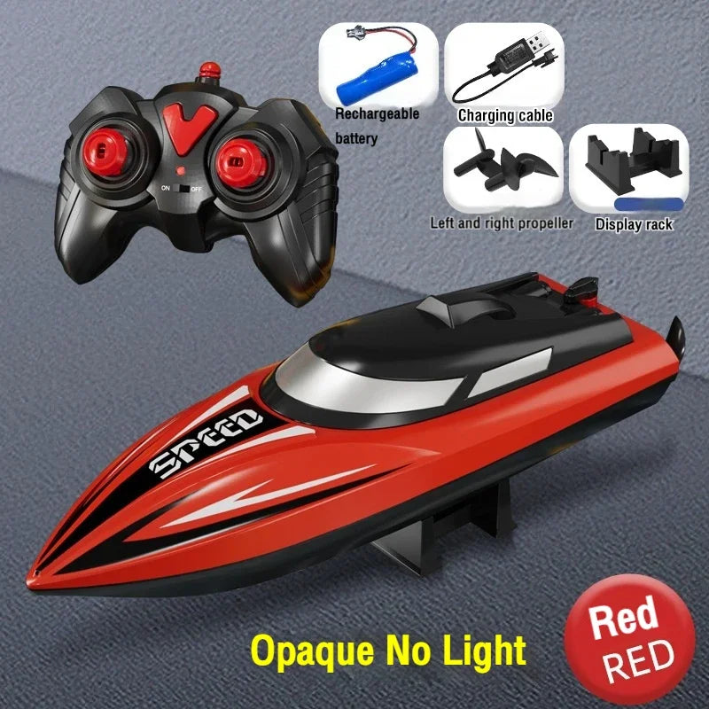 A red speedboat toy with a remote control, charging cable, and propeller display rack.