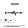 A black RPG-7 model kit with a removable warhead and helmet accessory.