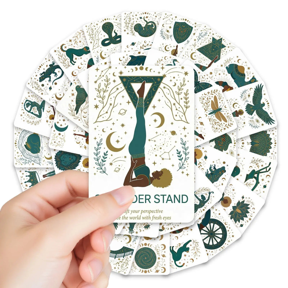 A hand holds a deck of yoga pose affirmation cards featuring various animal and nature motifs.