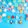 A collection of clear plastic capsule eggs filled with various surprise animal and cartoon figures for party favors