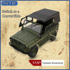 A dark green 1/12 scale RC rock crawler truck with a convertible top and foldable windshield.