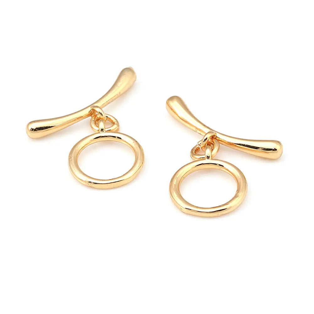 A pair of 18K gold round O-toggle clasps for bracelets and jewelry making.