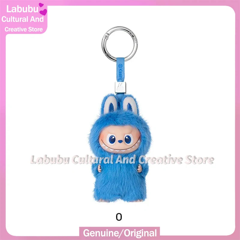 Blue fluffy Labubu plush doll keychain with a silver ring and charm