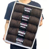 A package of five skeins of dark brown alpaca wool yarn for knitting and crochet.