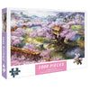 A 1000-piece jigsaw puzzle depicting a scenic landscape with pink blossoms and a waterfall.