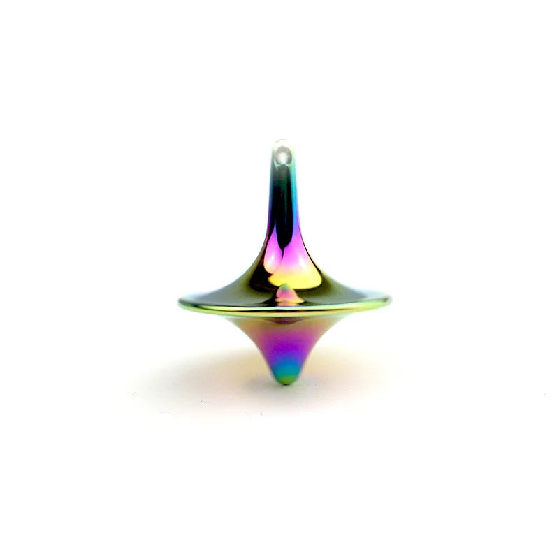 A metal fidget spinner with a smooth, iridescent finish, showing various shades of purple and green.