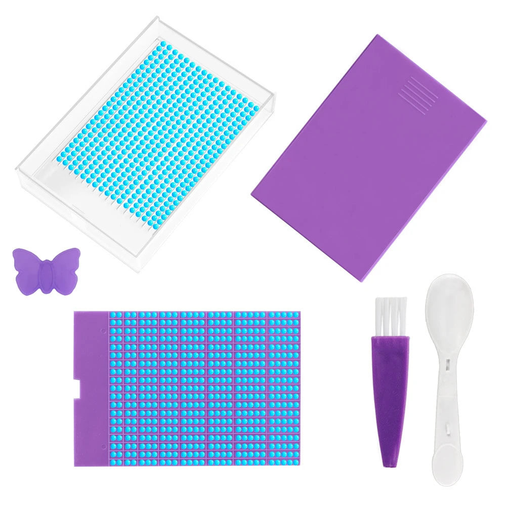 A purple diamond painting storage tray with a clear lid and a separate plastic tool is shown.