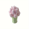 A silicone mold of a pink tulip bouquet with green stems.