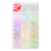 A clear plastic tray filled with various colors of smooth round glass beads for jewelry making