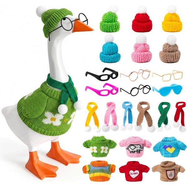 A mini goose costume set featuring a green knitted outfit and white body with various accessories.