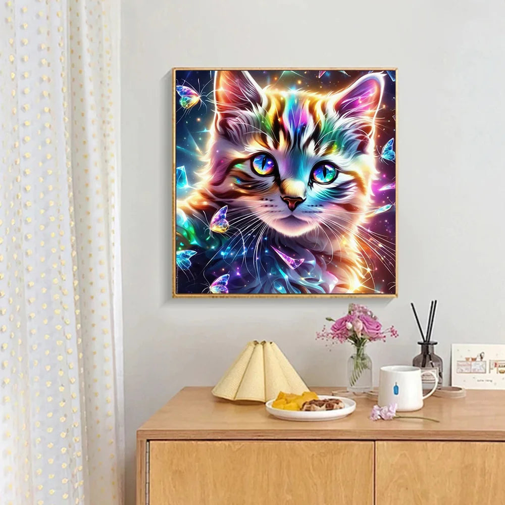 A vibrant diamond painting featuring a majestic tabby cat with glowing, colorful eyes and sparkling light effects.