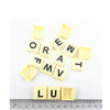 A set of yellow alphabet letter blocks spelling the word ORFAMILY for a game.