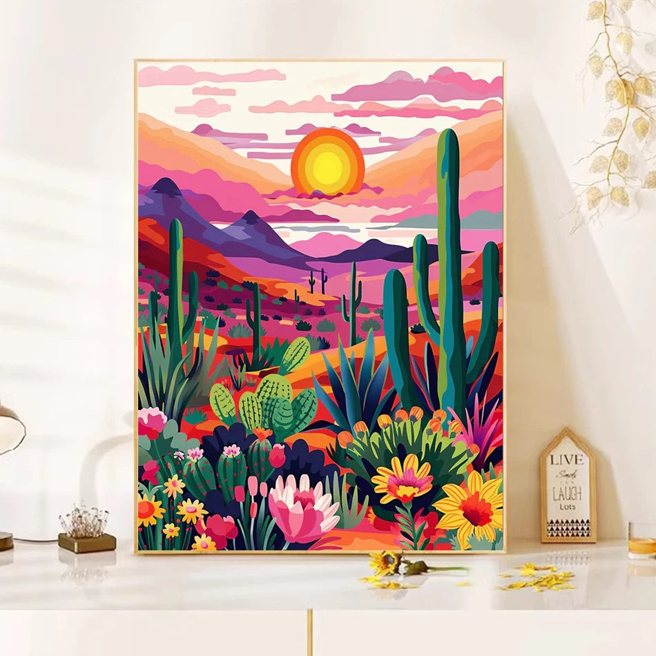 A vibrant painting of a desert landscape with pink and purple mountains under a bright orange sunset.