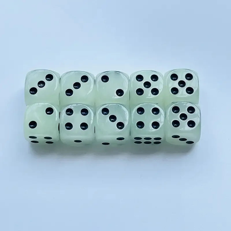 A set of ten glow-in-the-dark dice in a light green color arranged in a row.