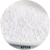 A white bowl filled with small, round, solid glass seed beads for jewelry and craft.