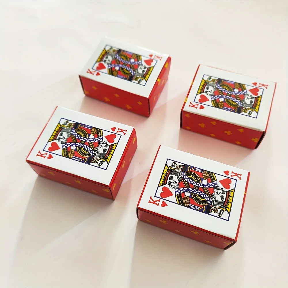 A set of portable mini playing cards packaged in red boxes featuring a King of Hearts design.