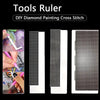 A set of stainless steel cross rulers used for DIY diamond painting projects.