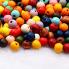 A colorful assortment of natural wooden beads in various shades and sizes for jewelry making and DIY crafts