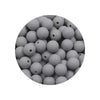 A circular arrangement of small, smooth, gray silicone beads in various sizes.