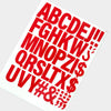 A sheet of red lettering spelling out the alphabet and symbols for DIY iron-on heat transfer patches.