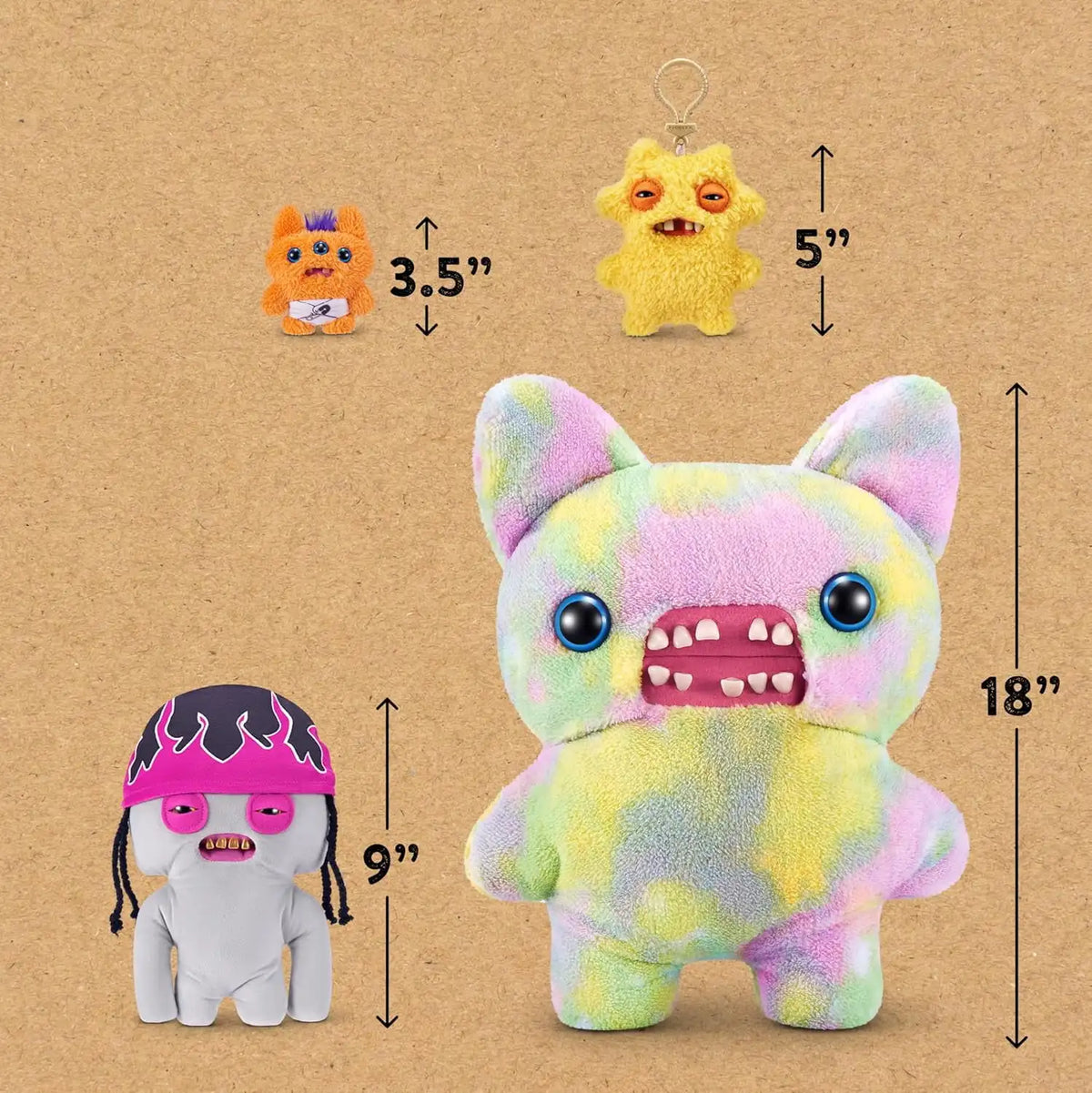 A large yellow and pink plush toy resembling a funny ugly monster with human-like teeth, shown next to smaller versions.