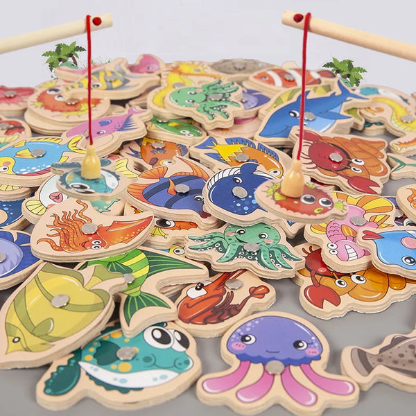 A collection of colorful magnetic wooden fishing toys shaped like fish and sea creatures.