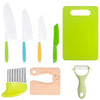 A set of safe plastic play knives and a green cutting board with a wooden food cutter tool.