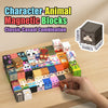 A hand holds a collection of character and animal magnetic blocks on a wooden surface.