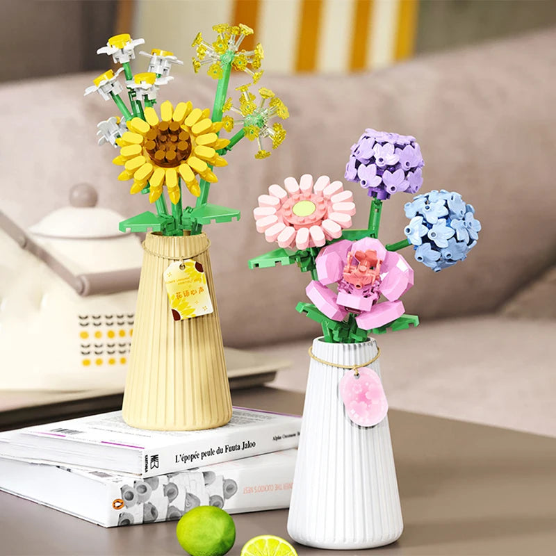 A set of flower bouquet building blocks with a vase featuring a sunflower and a purple flower.