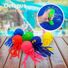 A collection of colorful octopus splash balls and bath toys for toddlers, including green, yellow, and orange varieties.