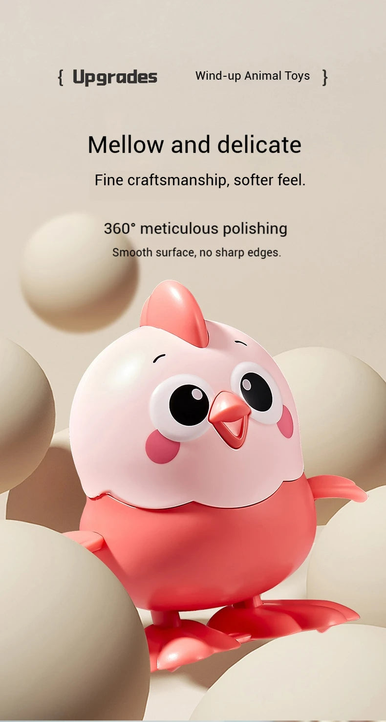A pink wind-up animal toy chick with large eyes and a rounded body is shown against a light background.