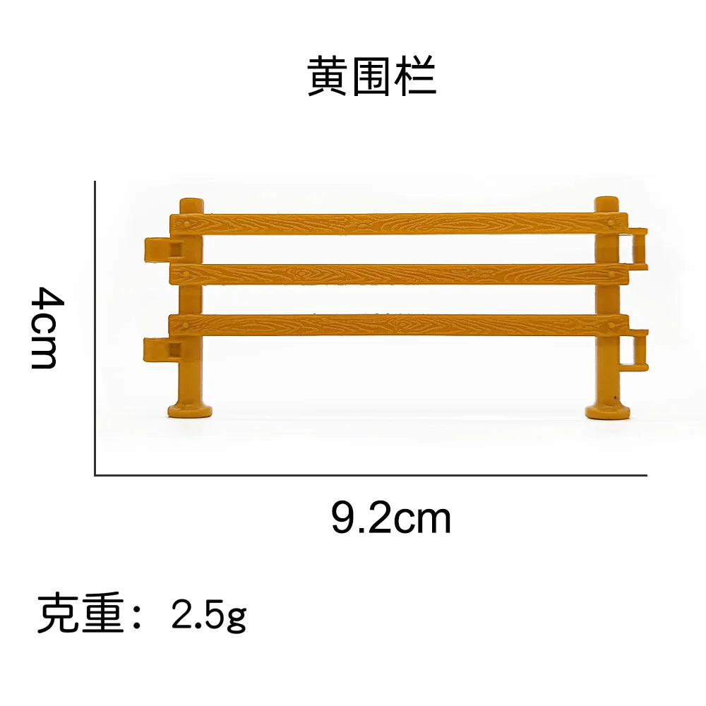 A small wooden miniature farm fence with a height of 4cm and a length of 9.2cm.