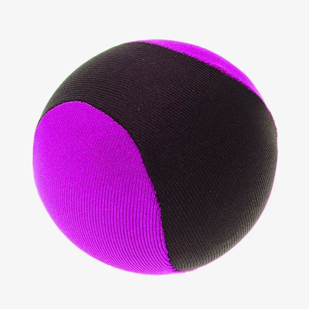 A black and magenta water bouncing ball with a textured surface.