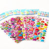 A collection of colorful 3D puffy stickers for kids featuring various shapes and designs in clear packaging.