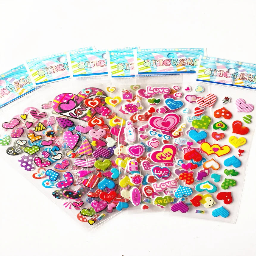 A collection of colorful 3D puffy stickers for kids featuring various shapes and designs in clear packaging.