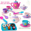 A colorful kids tea party playset featuring a pink teapot, cups, cookies, and accessories.