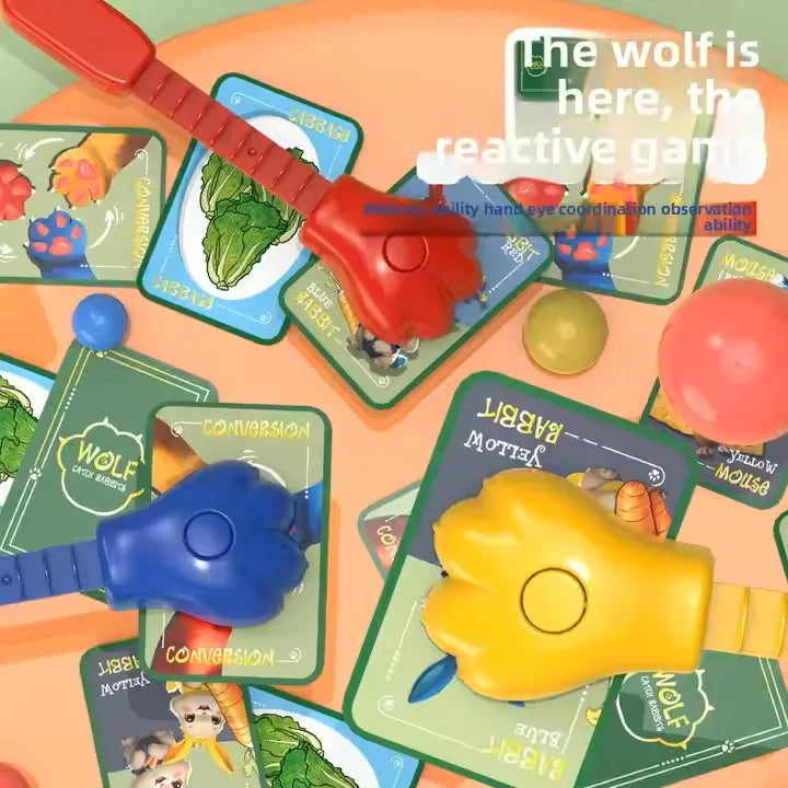 A board game featuring a cat and mouse theme with various colored cards and plastic figures.