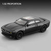 A black diecast model of a Dodge Challenger SRT Hellcat sports car shown in a side profile.
