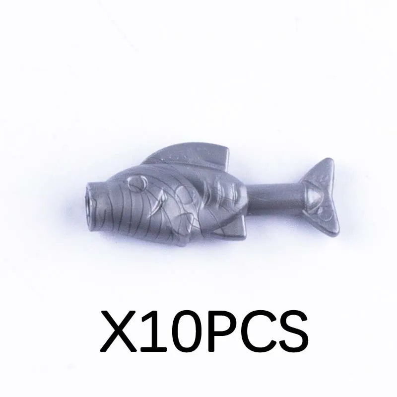 A gray plastic shark building block with a tail, part of a marine animal set.