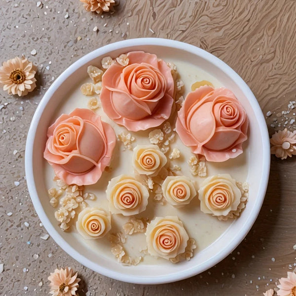 A bowl of light pink rose petals and dried flowers arranged on a wooden surface.