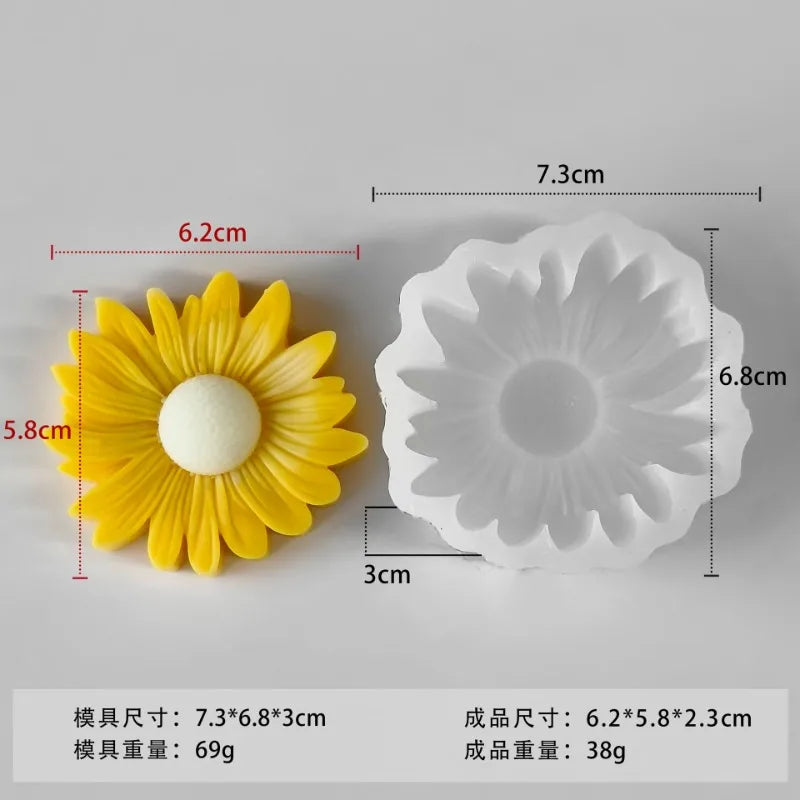 A yellow sunflower silicone mold for candle making and soap crafting shown next to its corresponding white mold.