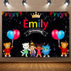 A black backdrop featuring a crown, the name Emily, and several cute cartoon animal characters celebrating a birthday.