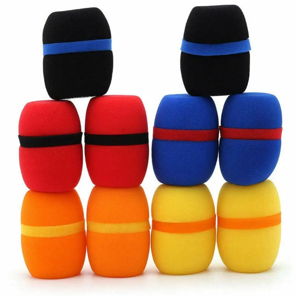 A set of five foam microphone windscreen covers in black, red, blue, and yellow.