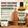 A bottle of IFUBO Wood Tableware Maintenance Oil next to wooden cutting boards and tea sets.