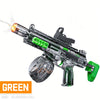 A green electric water blaster rifle with a suction cup attachment is shown firing a stream of water.