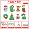 Display of finished product accessories including a snowman, a dinosaur, a bear, a Christmas stocking, a wreath, and various 