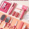 A pink kids hair salon role play set featuring various styling tools like scissors combs brushes and a hairdryer