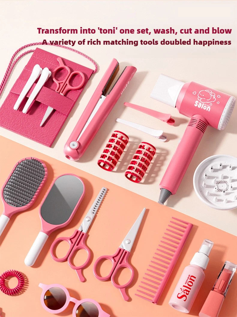 A pink kids hair salon role play set featuring various styling tools like scissors combs brushes and a hairdryer