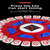A close-up view of a red alphabet game with various letter tiles and a central mechanism for timing.