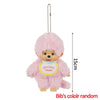 Pink Monchhichi plush keychain with a silver chain and a yellow tag